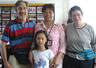 Myself, My Wife Susan and our Daughter with the Orphanage Director.